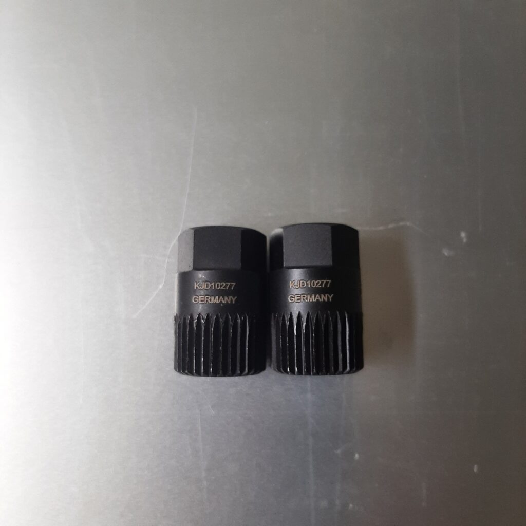 Laser-engraved identification markings on small industrial metal components